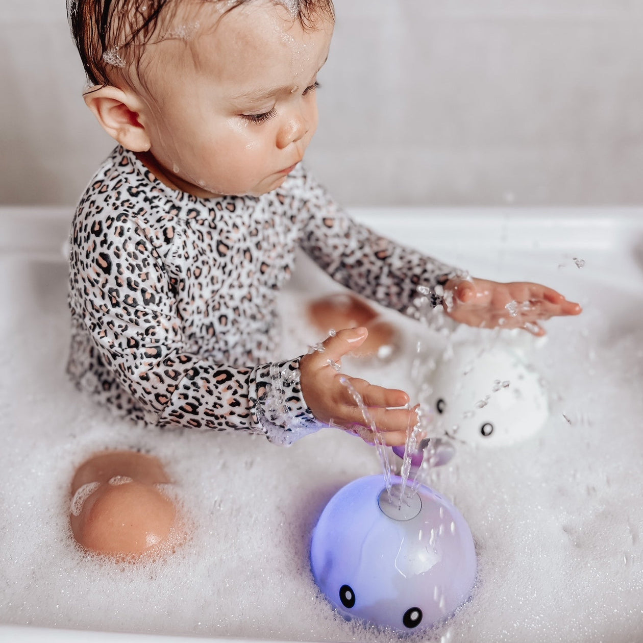 GlowWhale™ Light-Up Bath Toy